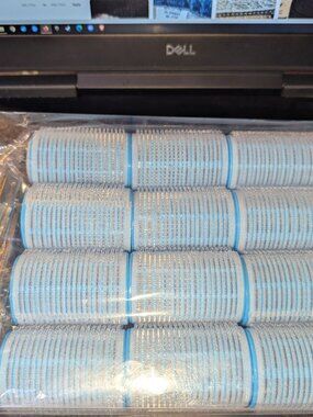 40 piece Overnight Hair Rollers Never used, has clips and a brush